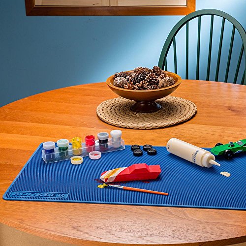 Rockler offers a wood glue applicator set with an 8oz bottle, glue spout, red cap, glue line centering attachment, and silicone brush for precise application. Their silicone glue mat (15"x30") is heat
