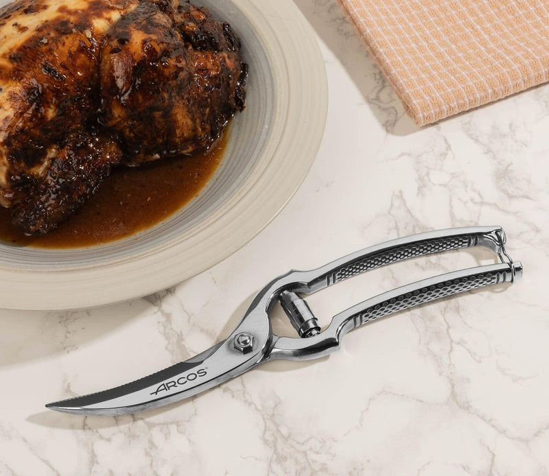 ARCOS Poultry Shears 10 Inch Nitrum Stainless Steel. Ergonomic Polyoxymethylene POM Handle. 250 mm. Series Ecopro. Butchers and professional cooks for cutting and chopping. Color Silver. Metallic
