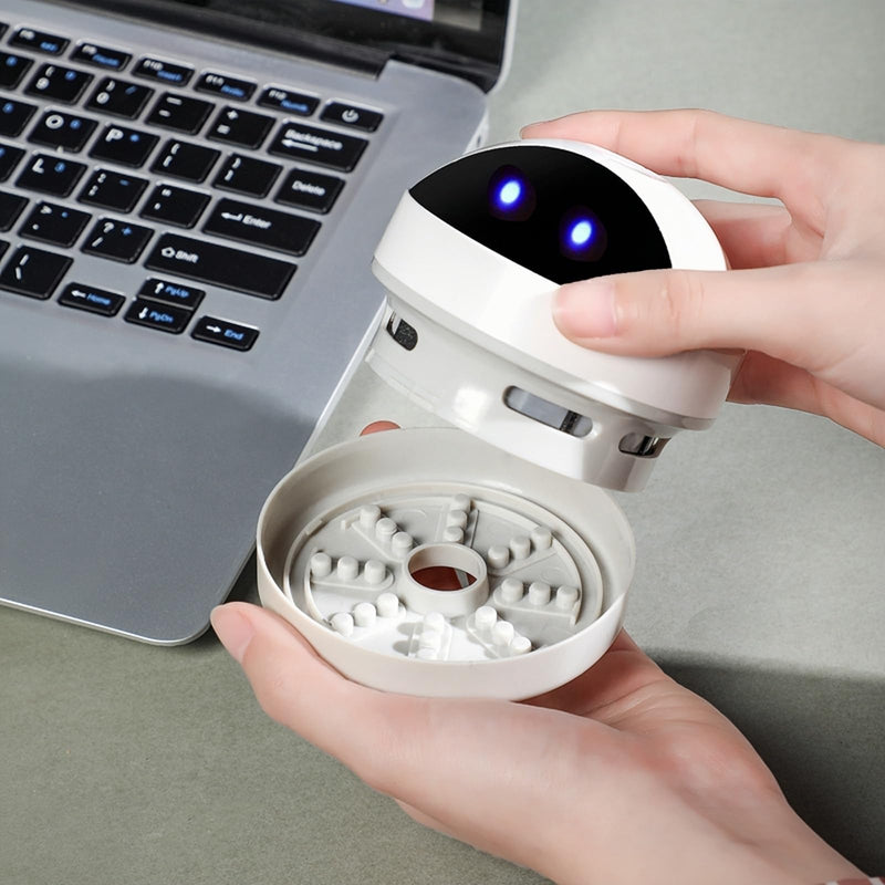 Desktop Vacuum Cleaner Mini,Cordless & Portable,Dust & Crumb Sweeper,Cute Cartoon Robot,USB,Easy to Remove Dust/Hair/Pet Hair/Crumbs on Desktop/Table/Keyboard/Sofa and etc,Lightweight Design