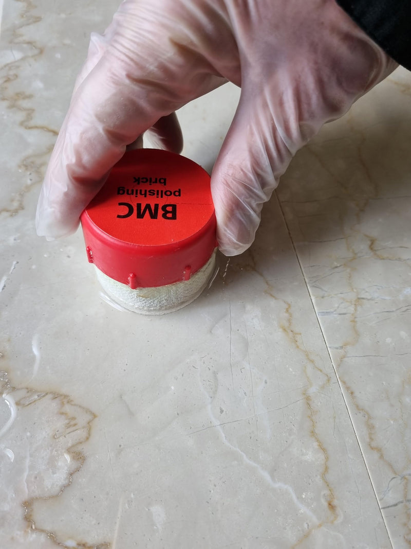 BMC Marble Polishing Brick is a slow release solid chemical polish for marble and limestone, which is used manually as a replacement for conventional polishing powder