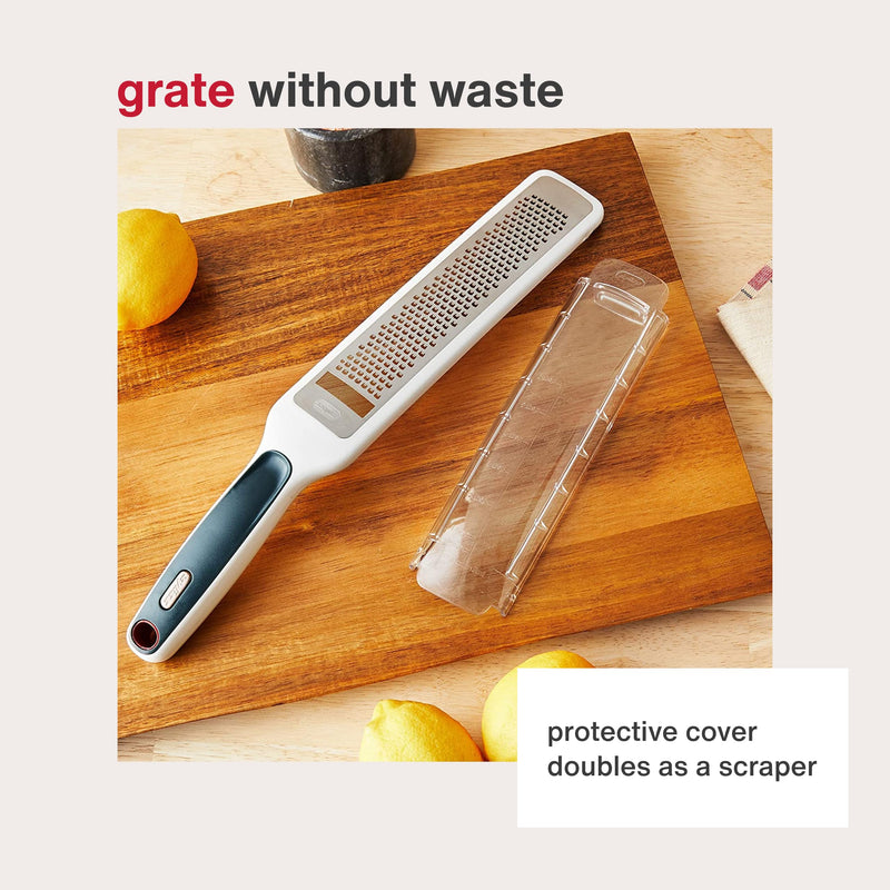 Zyliss SmoothGlide Rasp Grater – Fine Handheld Grater & Citrus Zester with Razor Sharp Stainless Steel Blade & Ergonomic Handle - Protective Cover with Measurements & Scraper - Handy Kitchen Essential