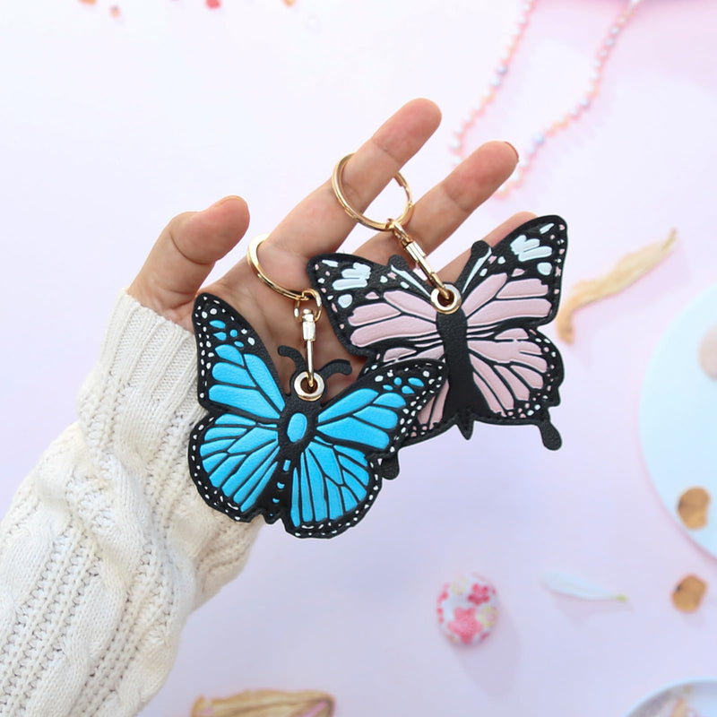 XEEWEN 2 Pack Cute Butterfly Airtag Leather Keychain Holder, Kawaii Pink Blue Key Ring Hidden Case Cover for Apple AirTag